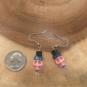 Handmade pink skull in a top hat dangle earrings